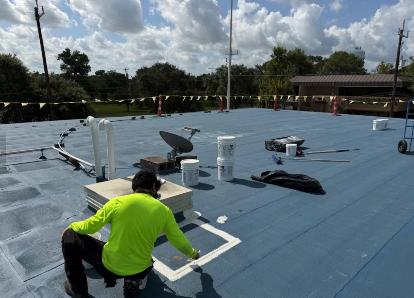 Ramtech crew member detailing a roof penetration during restoration