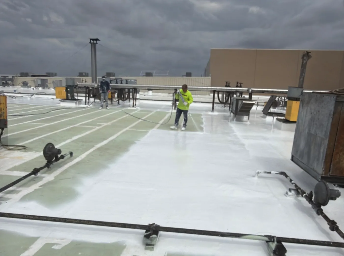 Ramtech crew member walking the finished restored roof
